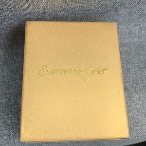 Real gold earrings - Teardropped shape and never used!